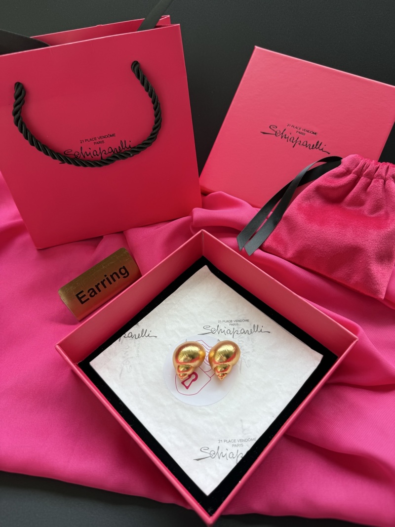 Серьги в форме улитки Schiaparelli