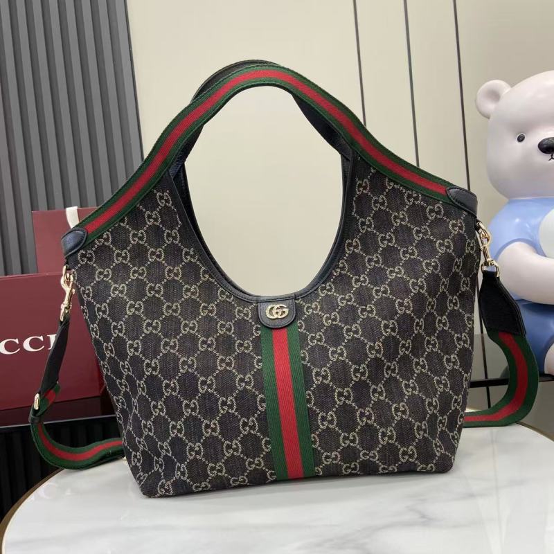 Сумка-хобо Gucci с принтом GG