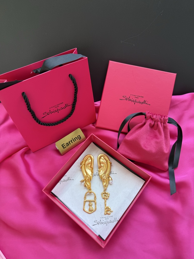 Серьги в форме уха с ключом и замком Schiaparelli