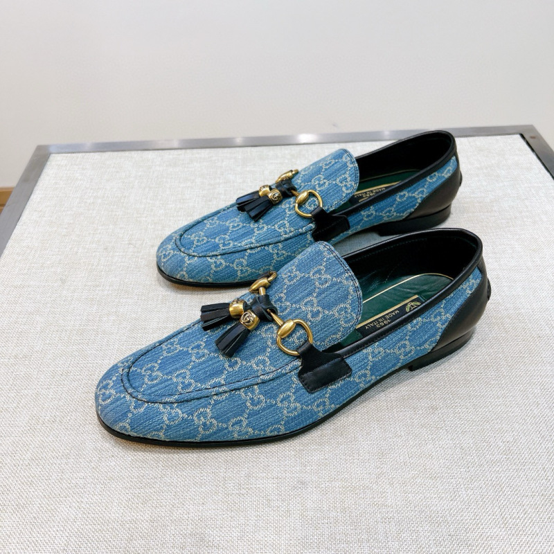 Мужские лоферы с узором GG и металлическими элементами Gucci