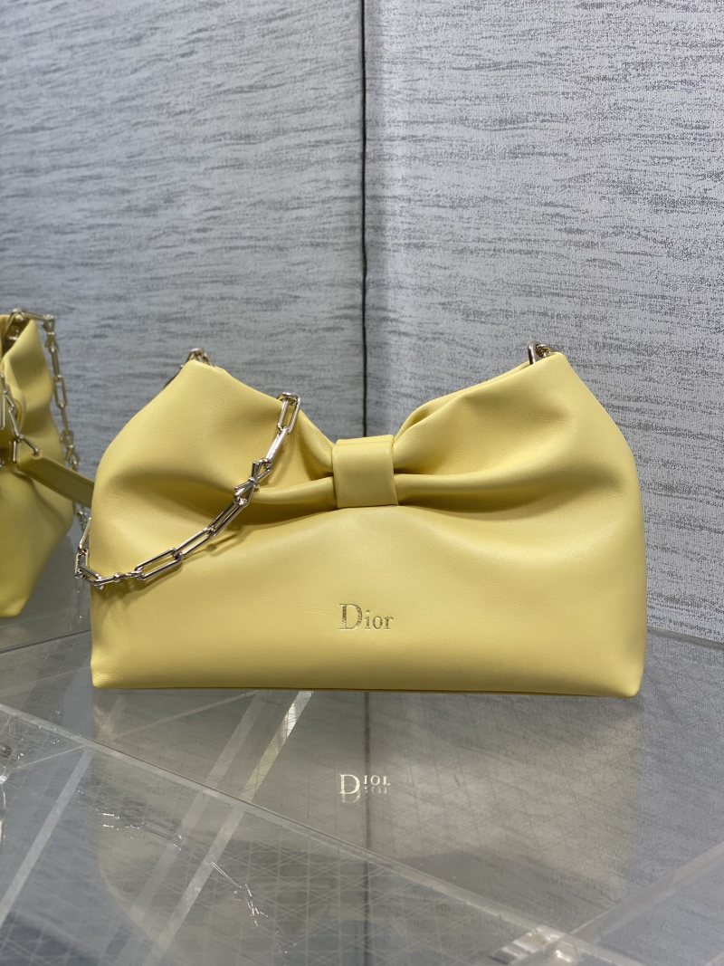 Желтая сумка Dior с бантом