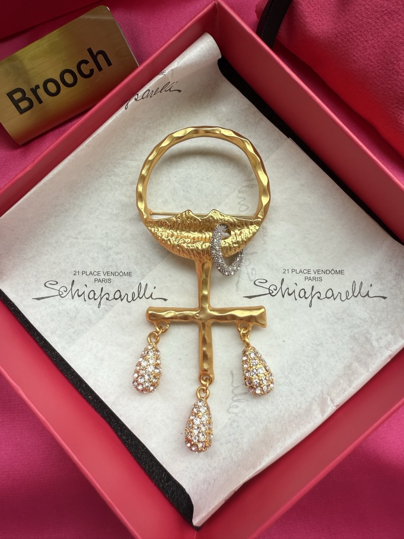 Брошь Schiaparelli