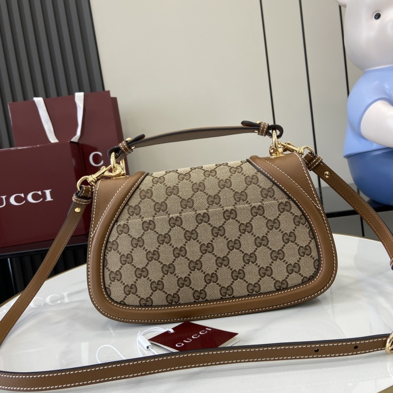 Сумка Gucci с монограммой и логотипом GG
