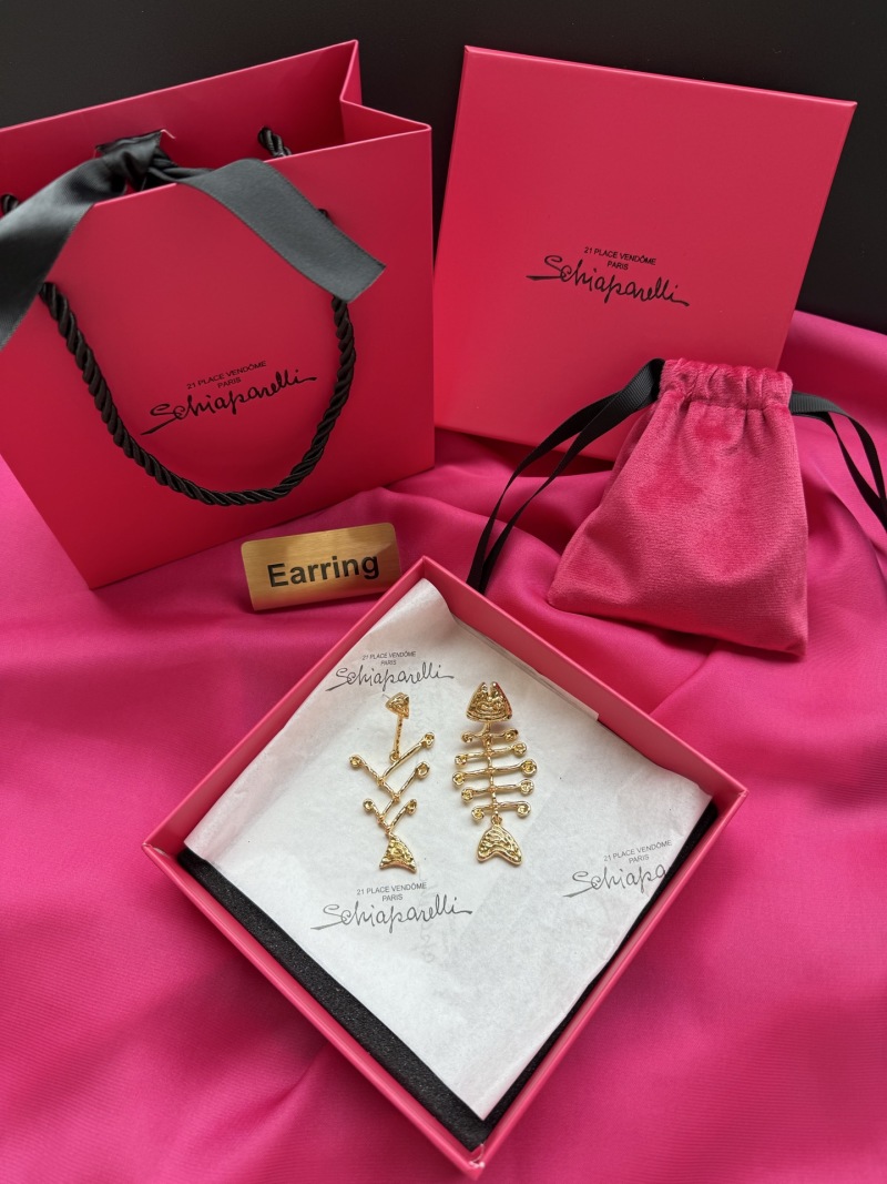 Серьги Schiaparelli в виде косточек