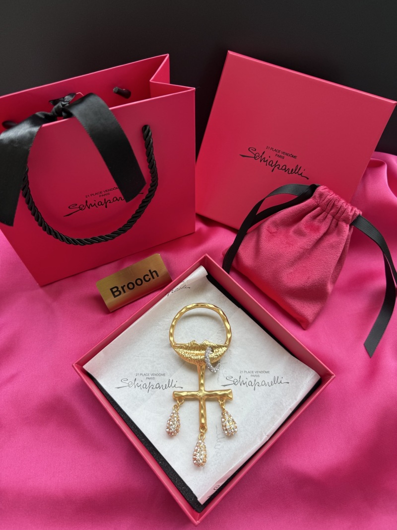 Брошь Schiaparelli