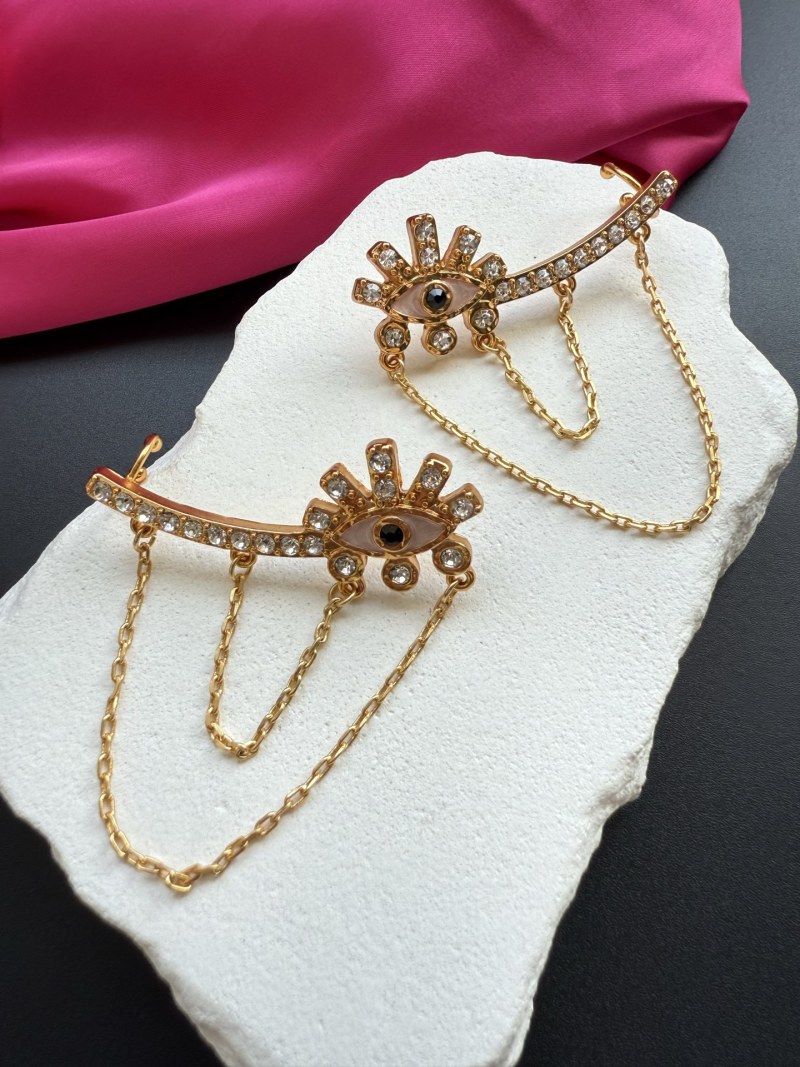 Серьги с глазом-змеей Schiaparelli