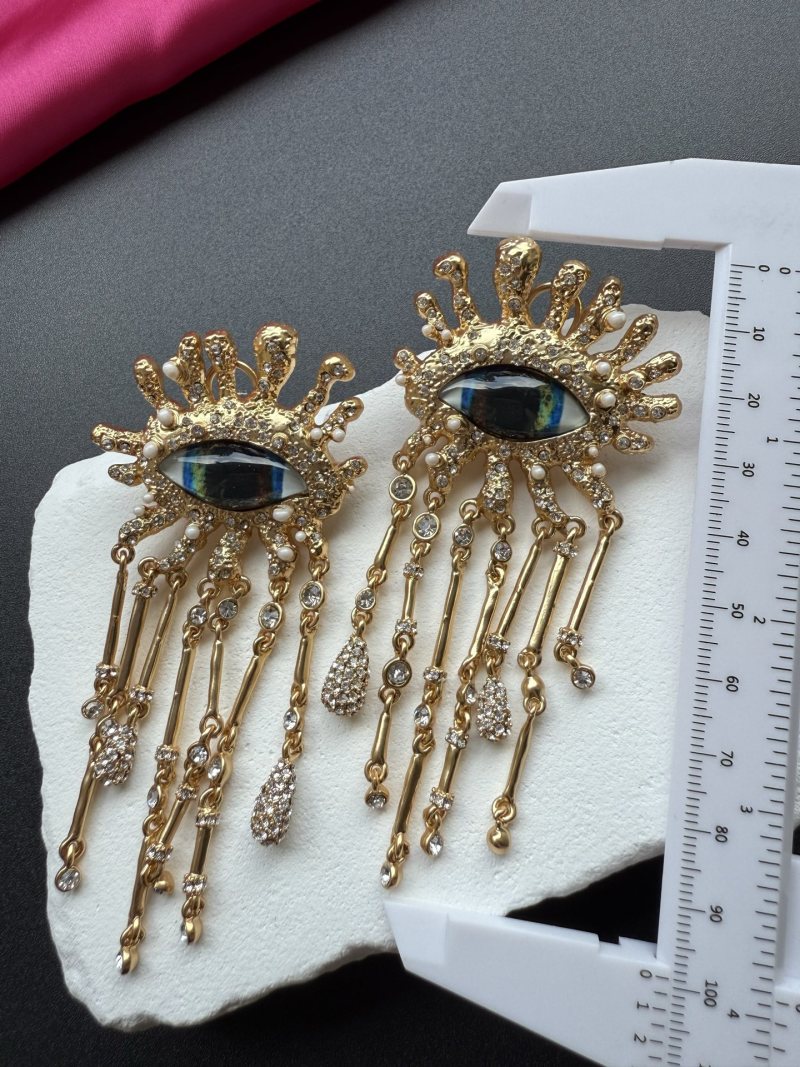 Серьги с глазом и кистями Schiaparelli