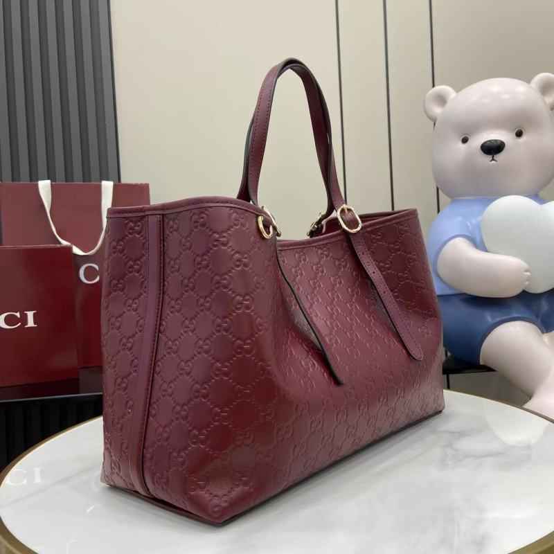 Сумка-тоут Gucci бордовая с тиснением