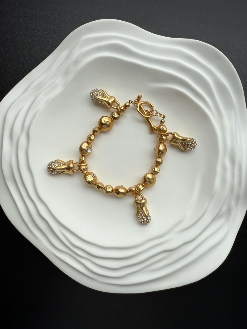 Браслет с подвесками Schiaparelli