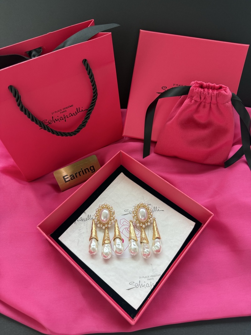Серьги с жемчугом и позолоченными элементами Schiaparelli