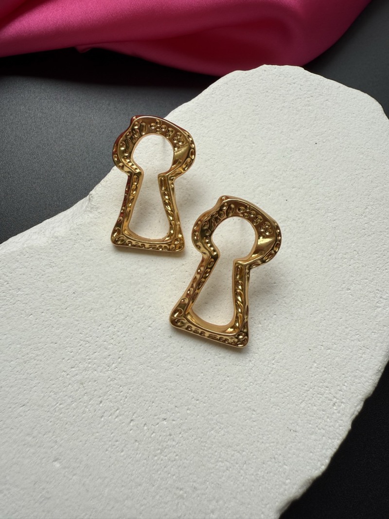 Серьги в форме ключа Schiaparelli