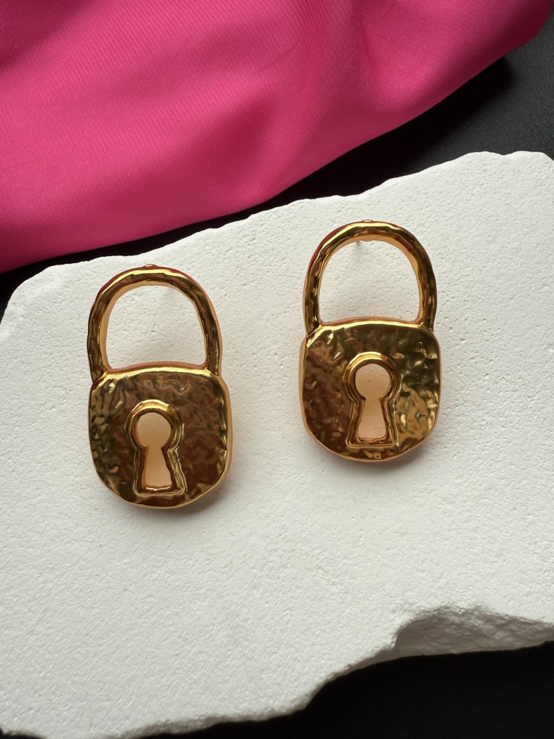 Серьги в форме замков Schiaparelli