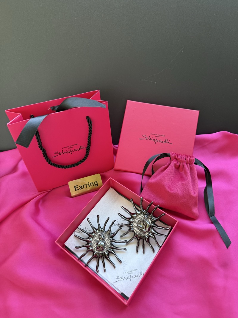 Серьги в форме солнца с лицом Schiaparelli