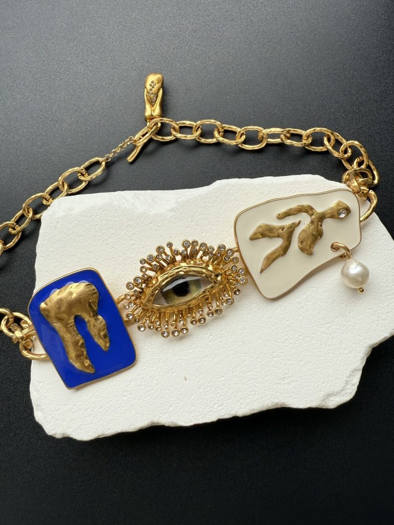 Колье Schiaparelli с декоративными элементами