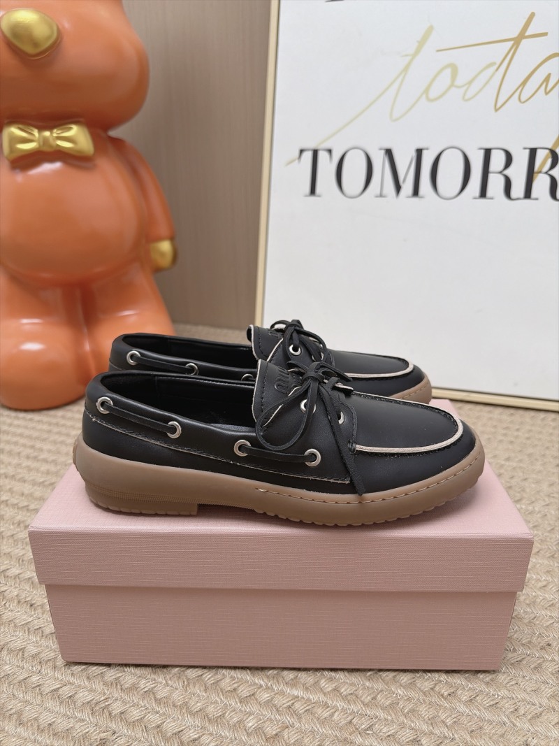 Женские лоферы Miu Miu черного цвета