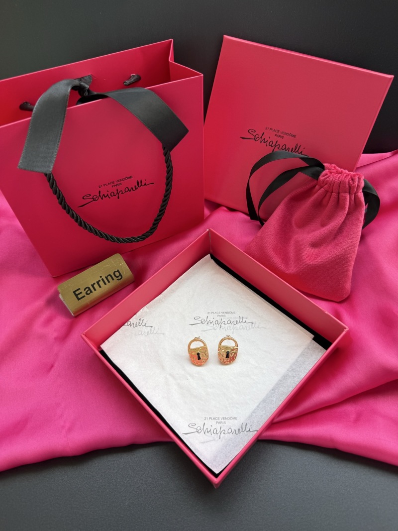 Серьги в виде замков Schiaparelli