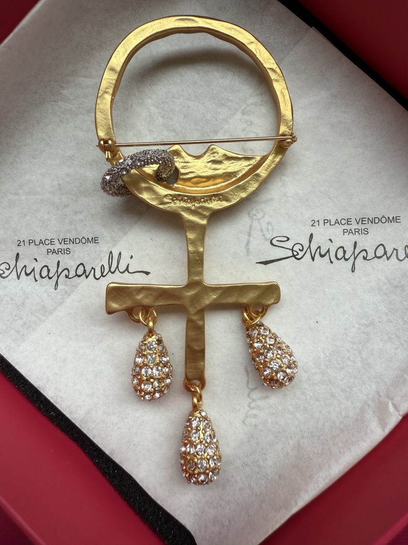 Брошь Schiaparelli