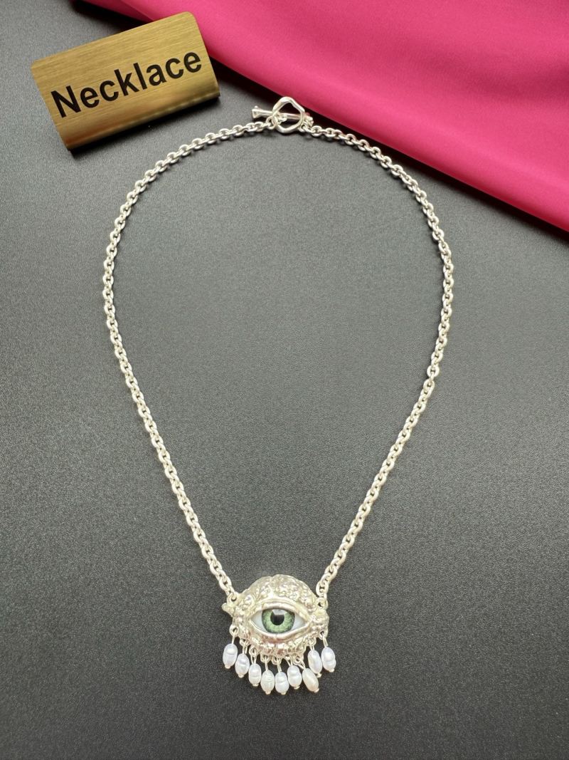 Колье с глазом Schiaparelli