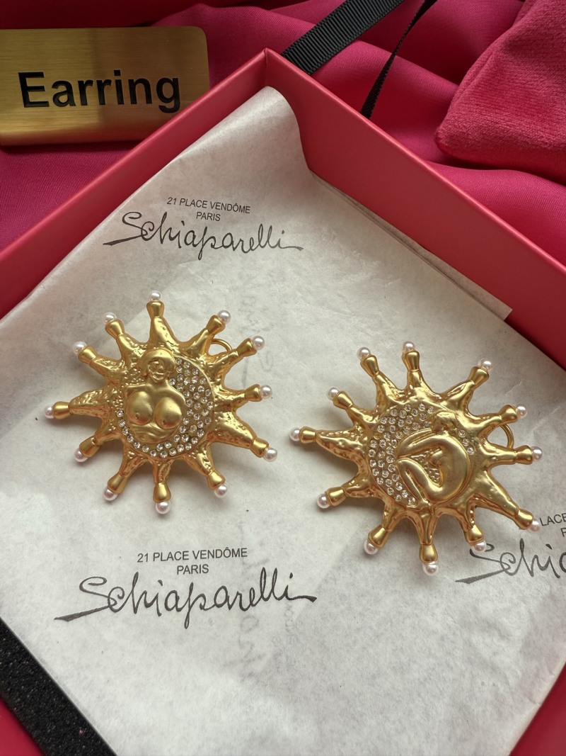 Серьги в виде солнца с кристаллами Schiaparelli