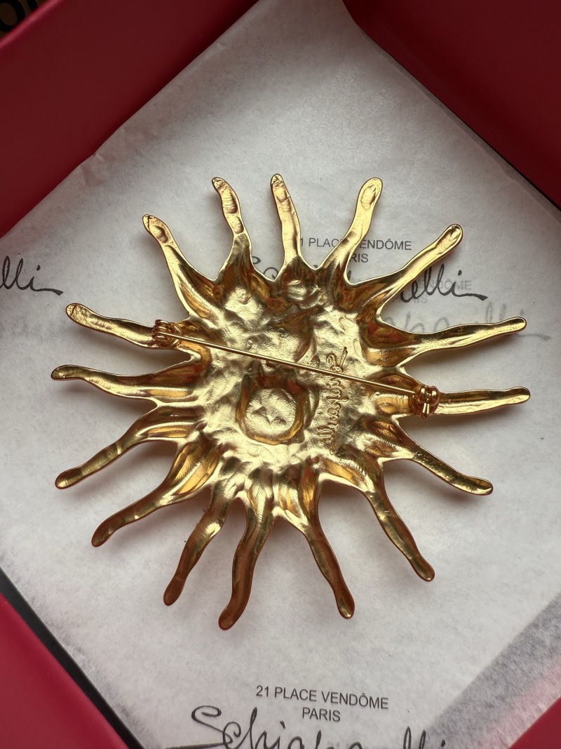 Брошь в виде солнца с кристаллами Schiaparelli
