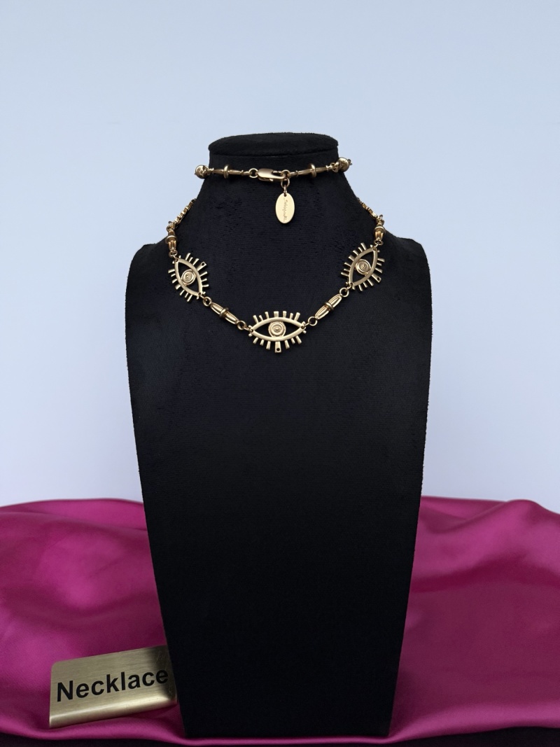 Золотистое колье с глазами Schiaparelli