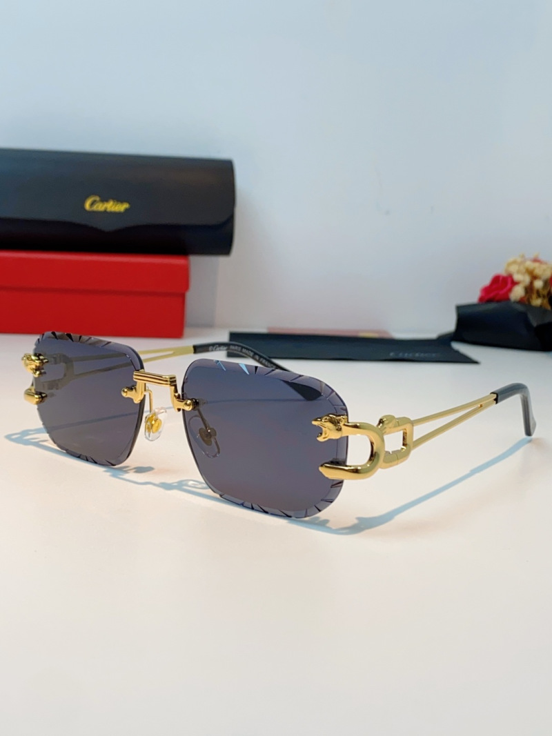 Солнечные очки Cartier в золотой оправе