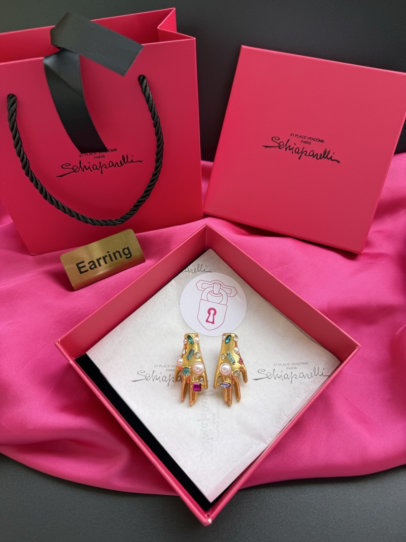 Серьги в виде рук с камнями Schiaparelli