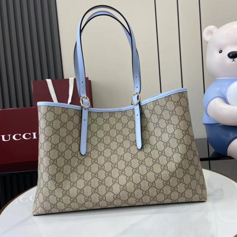 Сумка-тоут Gucci с монограммой и голубыми ручками
