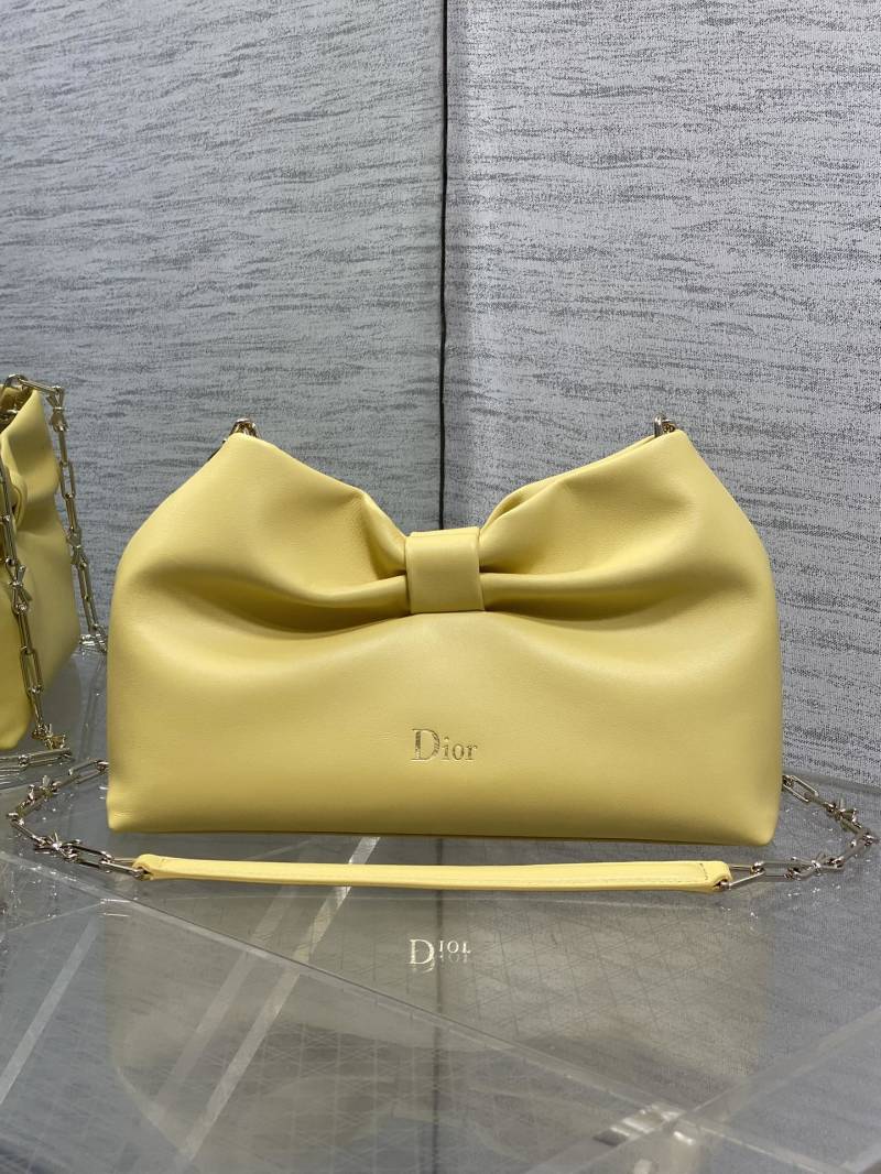 Желтая сумка Dior с бантом