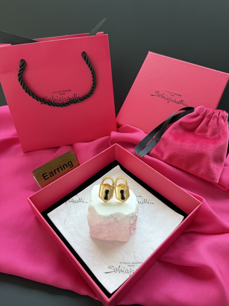 Серьги в виде замков Schiaparelli