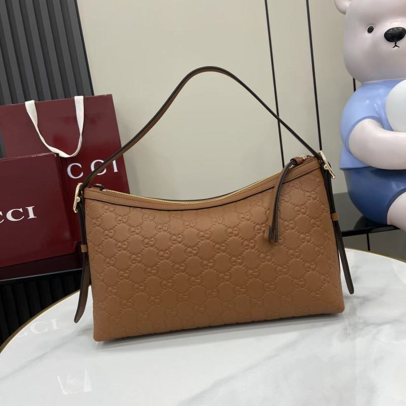 Сумка Gucci с монограммой