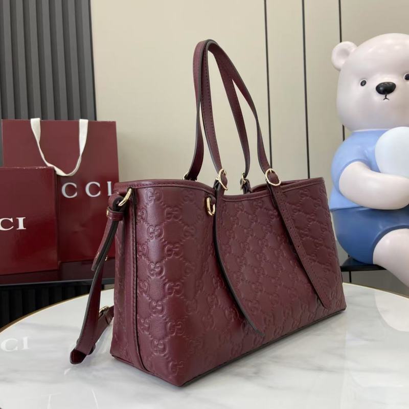 Сумка-тоут Gucci бордовая с тиснением