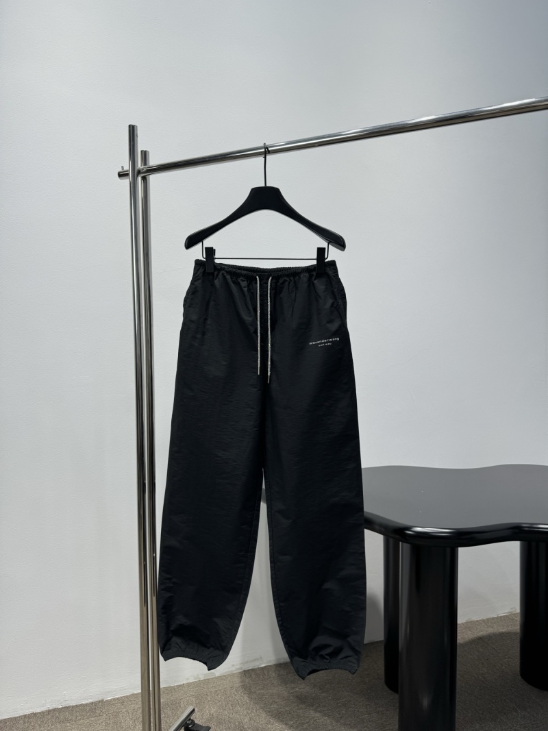 Черные брюки с логотипом Alexander Wang и декоративными шнурками