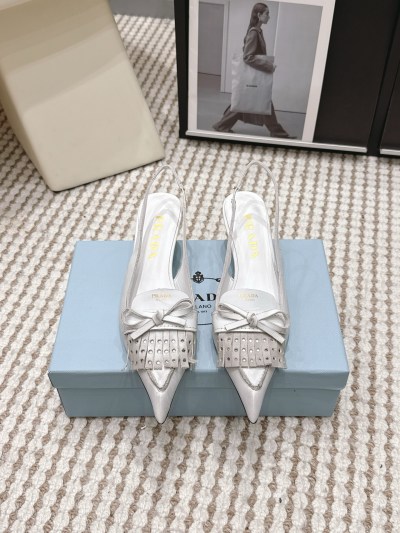 Женские туфли Prada с бантом и бахромой