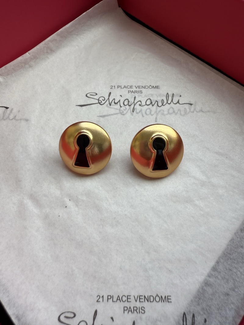 Серьги в форме ключевого отверстия Schiaparelli