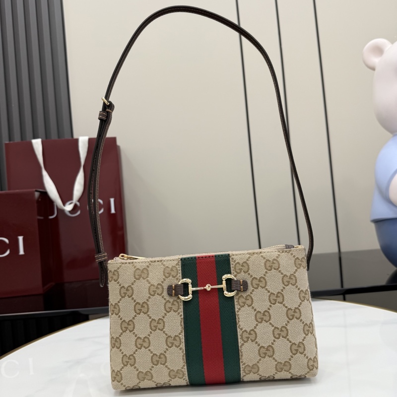 Сумка-клатч Gucci с монограммой и ремешком