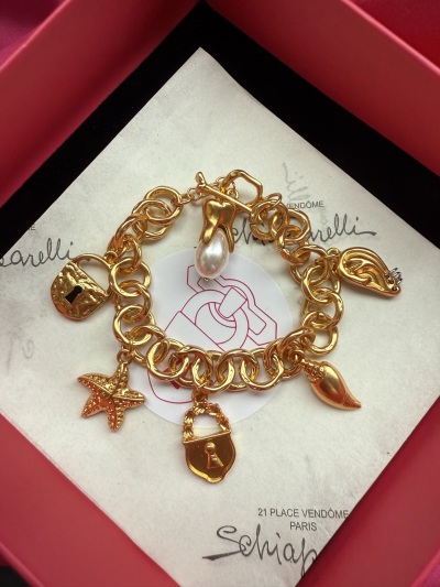 Браслет Schiaparelli с подвесками