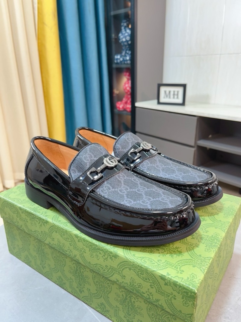 Мужские черные мокасины с декоративной пряжкой Gucci