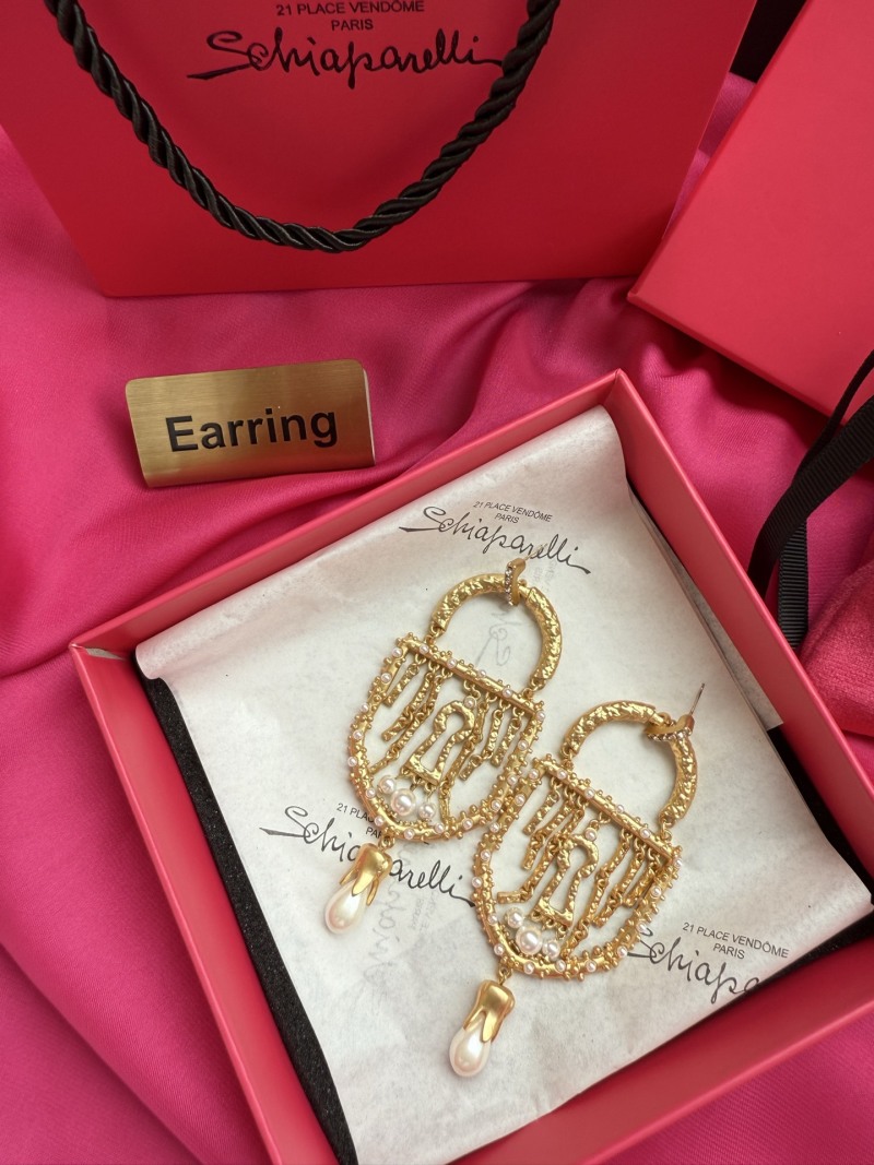 Золотистые серьги с жемчугом и кисточками Schiaparelli