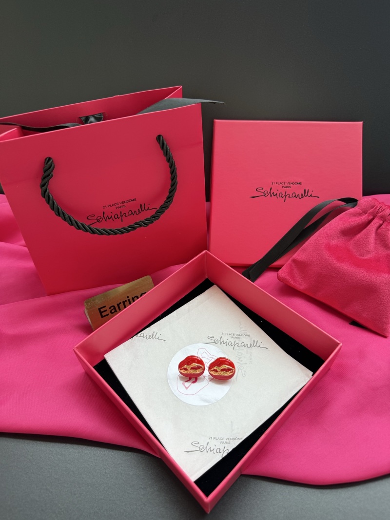 Серьги в форме губ с золотым узором Schiaparelli