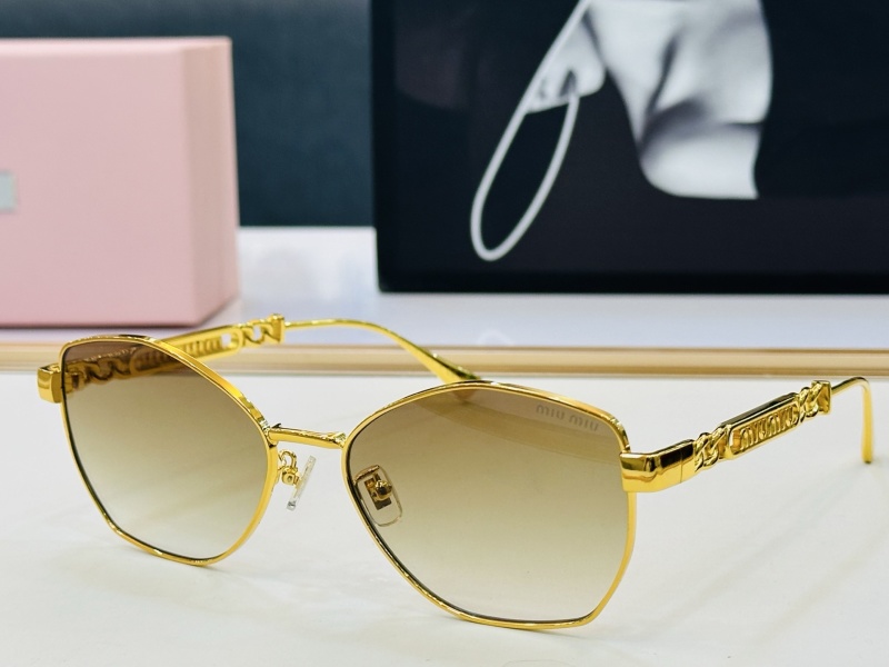 Солнцезащитные очки Miu Miu золотистые