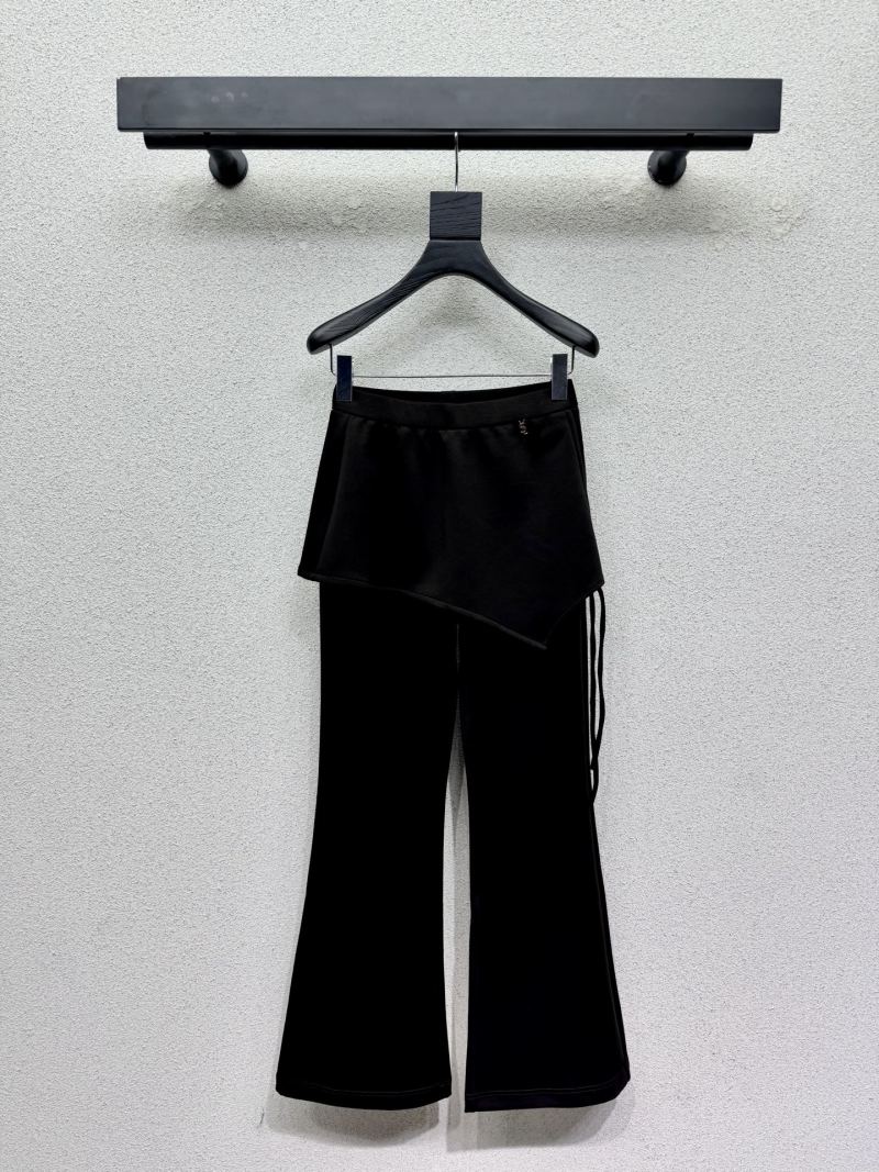 Чёрные брюки Saint Laurent с асимметричной юбкой