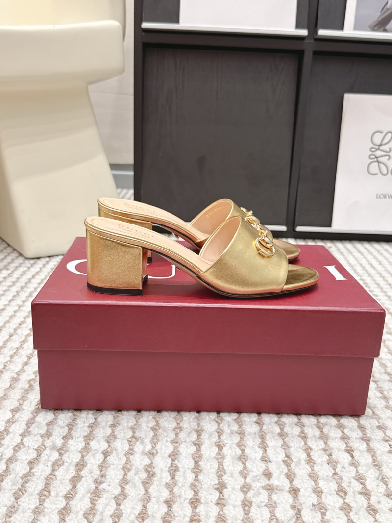 Женские золотые мюли с металлической пряжкой Gucci