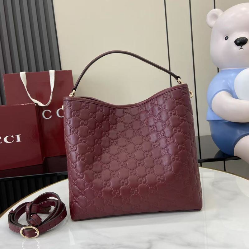 Сумка Gucci бордовая с тиснением
