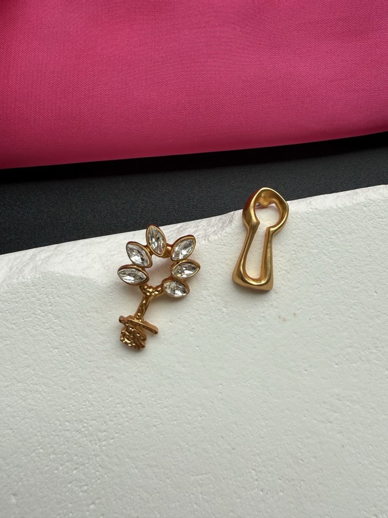 Серьги в форме цветка с кристаллами Schiaparelli