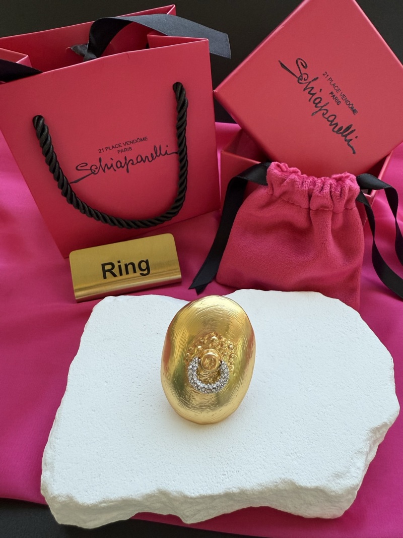 Золотистое кольцо с кристаллами Schiaparelli