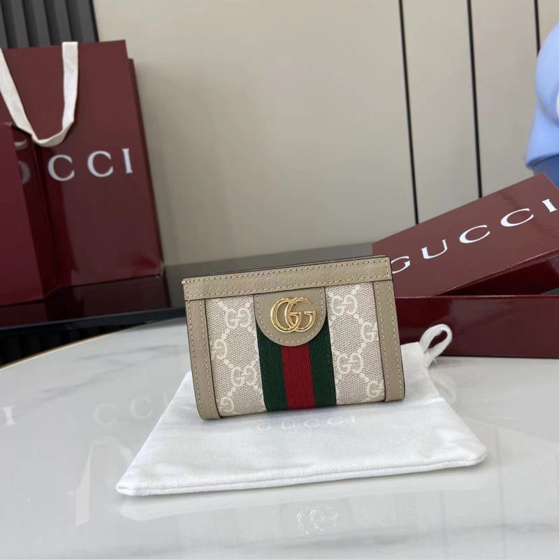 Кошелёк Gucci с монограммой и логотипом GG