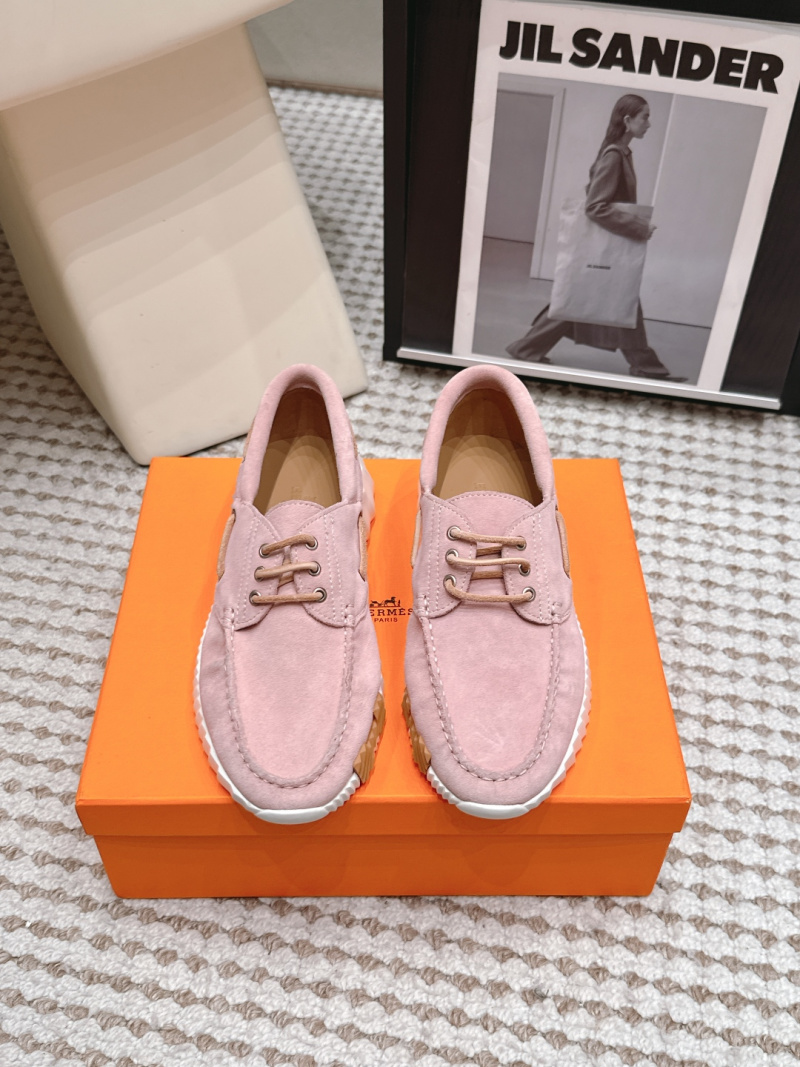 Женские кроссовки розового цвета Hermès