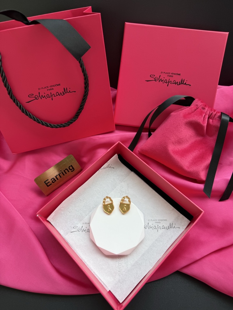 Серьги в форме замка Schiaparelli