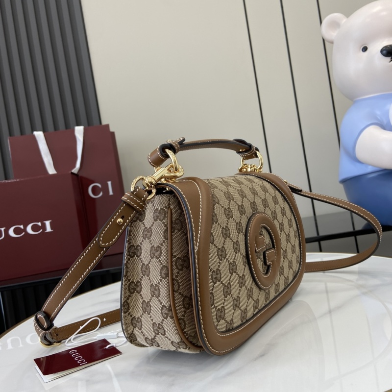 Сумка Gucci с монограммой и логотипом GG